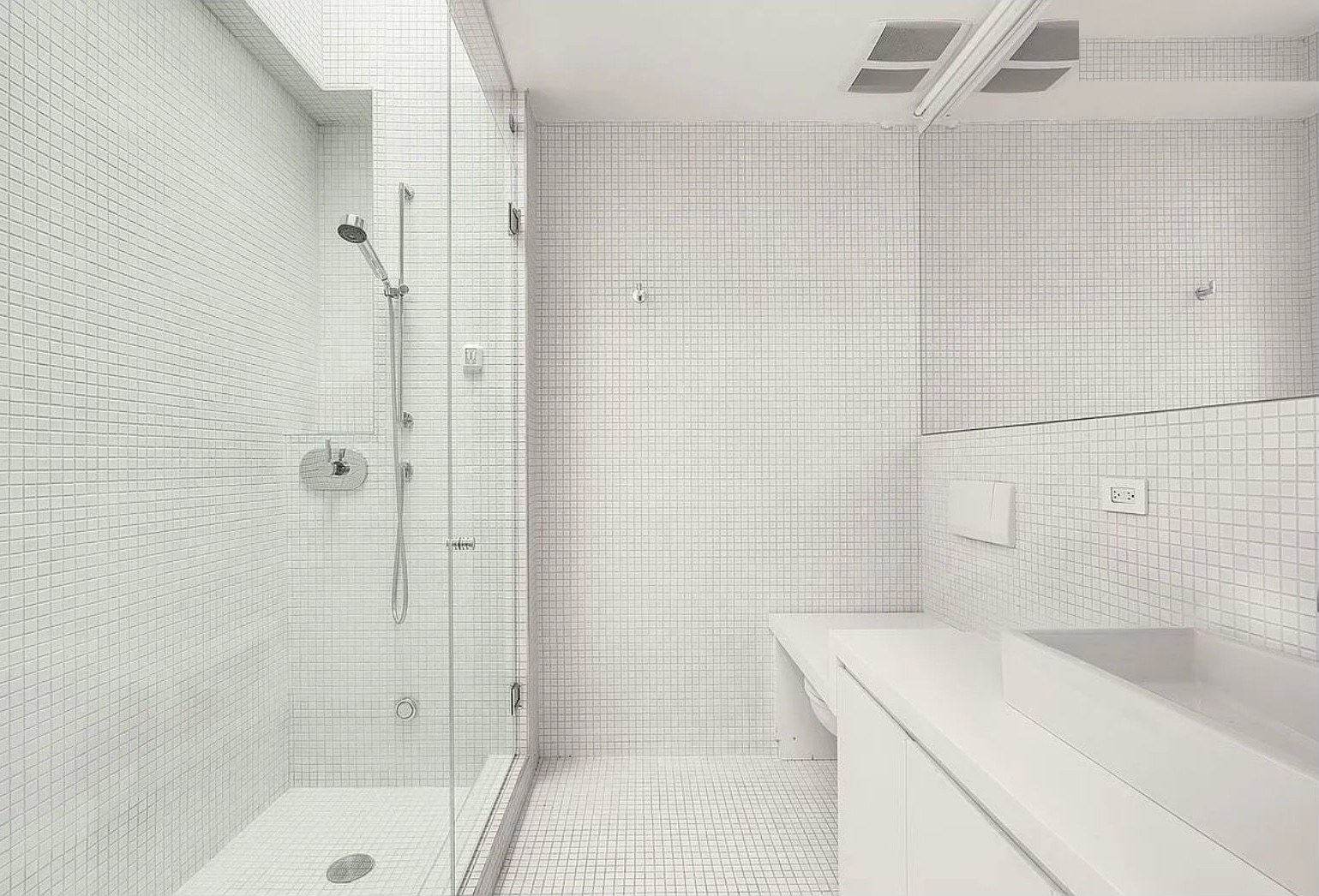 Listing photo 8 — white tile bathroom